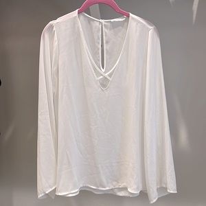 Xs  white blouse.